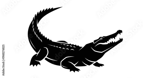 Black silhouette of a powerful crocodile with open jaws.