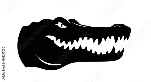 Black silhouette of an alligator head with sharp teeth.