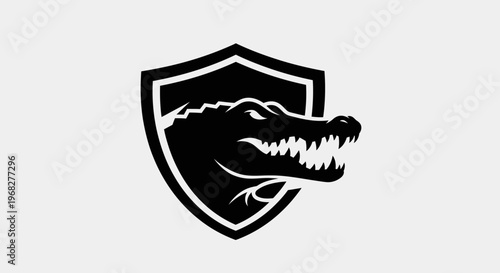 Alligator or Crocodile Head in Shield Logo Design.