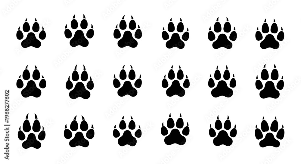 Fototapeta premium Black animal paw prints set on a white background.
