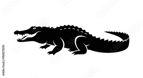 Black silhouette of a fierce alligator or crocodile, a powerful reptile with sharp teeth and scaly skin, isolated on a white background.
