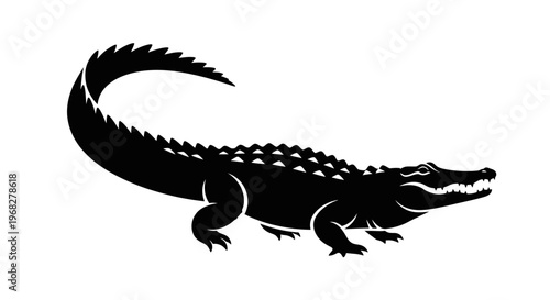 Black silhouette of a powerful alligator or crocodile.