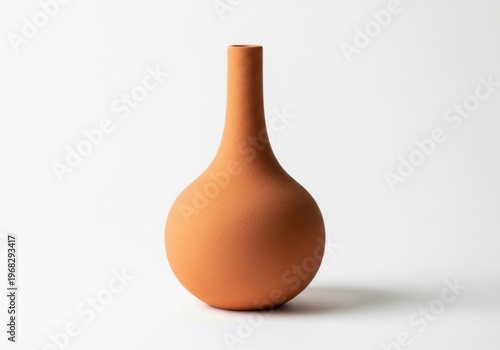 Minimalist terracotta vase with a narrow neck and round body isolated on white background