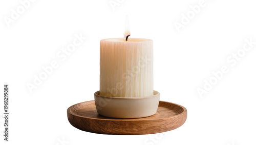 Obraz na plátně Tall ribbed beeswax candle burning gently emitting warm light within a ceramic h
