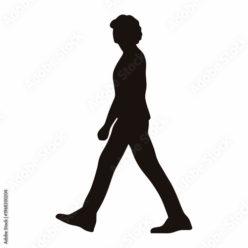 Silhouette of a confident person walking forward, expressing individuality and motion