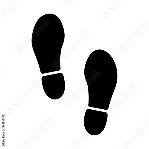 Black footprints isolated on white background indicating a path or trail