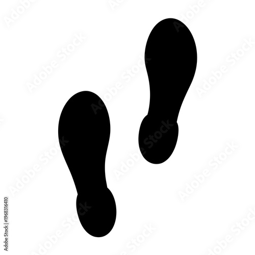 Black Footprints on a White Background Illustrating Movement and Direction