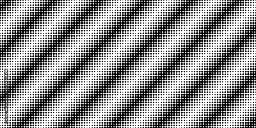 Halftone diagonal stripes made of dots creating gradient transition. Abstract pattern with circular elements forming slanted lines on contrasting monochrome background.