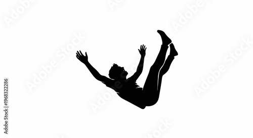 Black silhouette of a person falling with arms outstretched