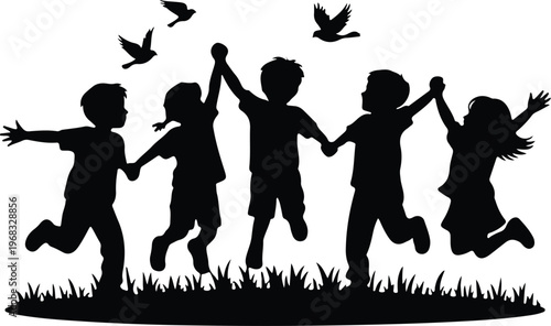 Silhouette of happy children jumping in grass with birds flying overhead freely
