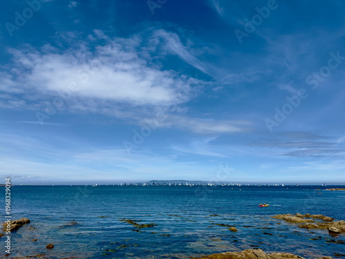 Plenty of blues. Calm sea.