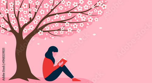 Woman reading book under blooming cherry blossom tree.