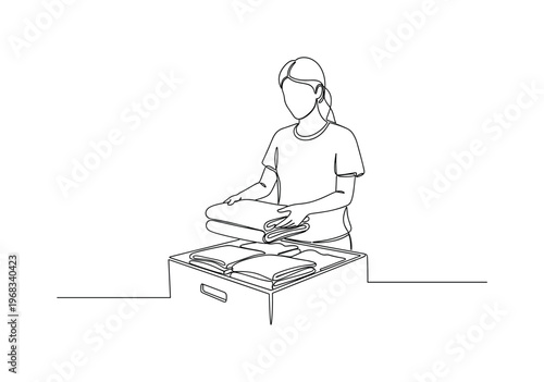 Organizing Seasonal Wardrobe. Minimalistic one-line drawing individual folding and storing summer clothes neatly in drawer or box, continuous single black line