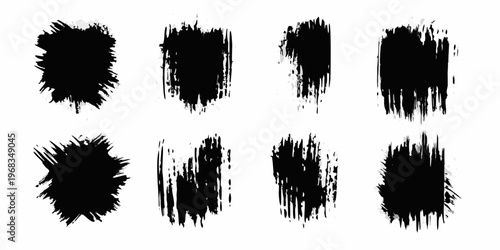 Abstract collection of irregular black brushstroke shapes on white background