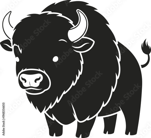 Large black bison with horns standing.