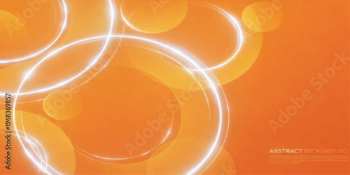 Fresh orange juice in a glass with a citrus fruit slice is isolated on a white healthy breakfast table against an abstract orange background with circles