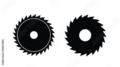 Two circular saw blades depicted in a striking black silhouette