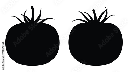 Two black tomato shapes presented as a striking graphic silhouette