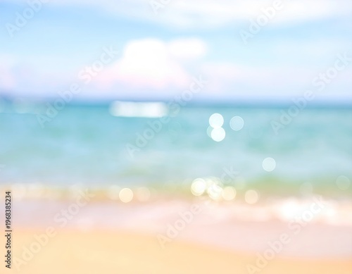 Blurred beach scene with ocean and sky background.