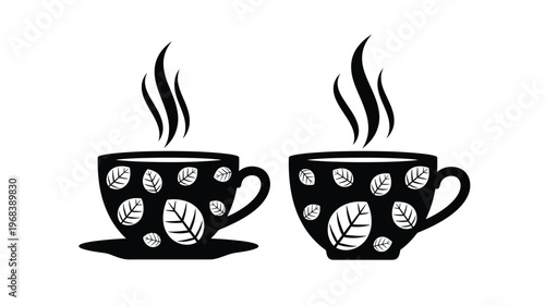 Two steaming cups of tea with floral designs a black silhouette
