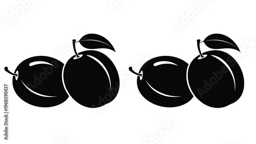 Four black apples arranged closely together a striking silhouette