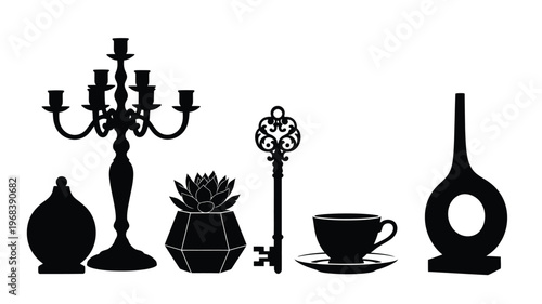 Elegant antique objects arranged in a striking black silhouette