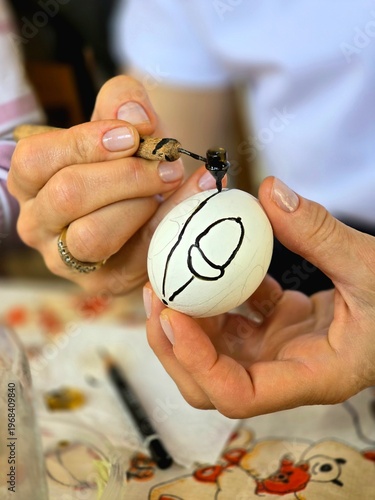 Woman holding easter eggs. The color of eggs for Easter.