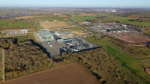 erial view of Bramford National Grid electrical substation near Ipswich, UK, critical energy infrastructure and high voltage power lines, electricity distribution and transmission site in Suffolk.