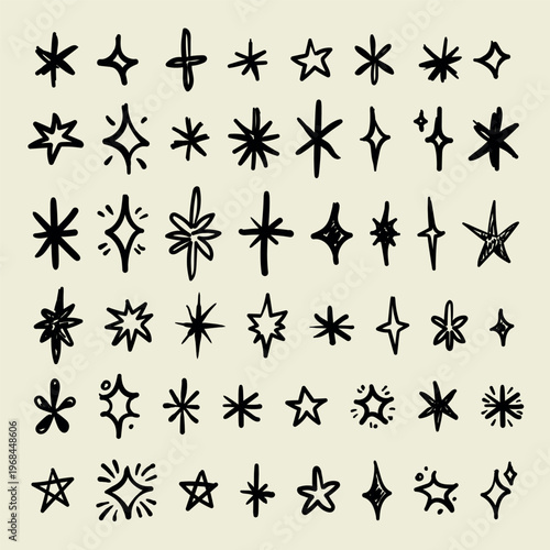 Set of whimsical, hand-drawn vector stars, sparkles and twinkles 