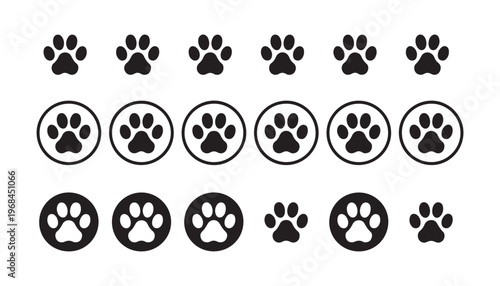 Assortment of dog paw prints and paw print icons in circles with varied fill styles.