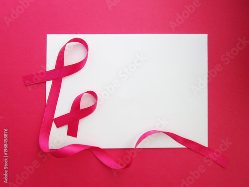            Breast Cancer Awareness Month poster background, pink ribbons.                    
