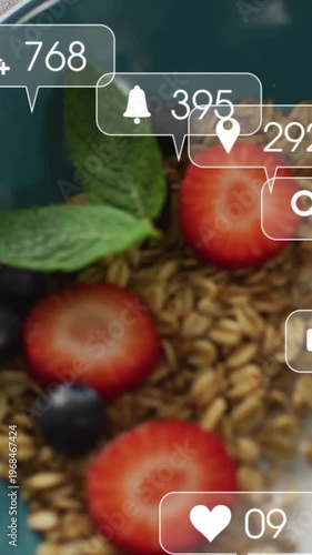 Vertical video: Teal bowl showing oats fruit as metrics updating badges over spoon for marketers