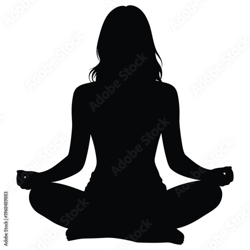 A woman practices a meditative lotus position depicted as a striking black silhouette