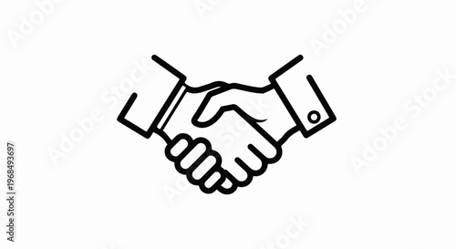 Two hands clasped in a business handshake, conveying agreement and partnership