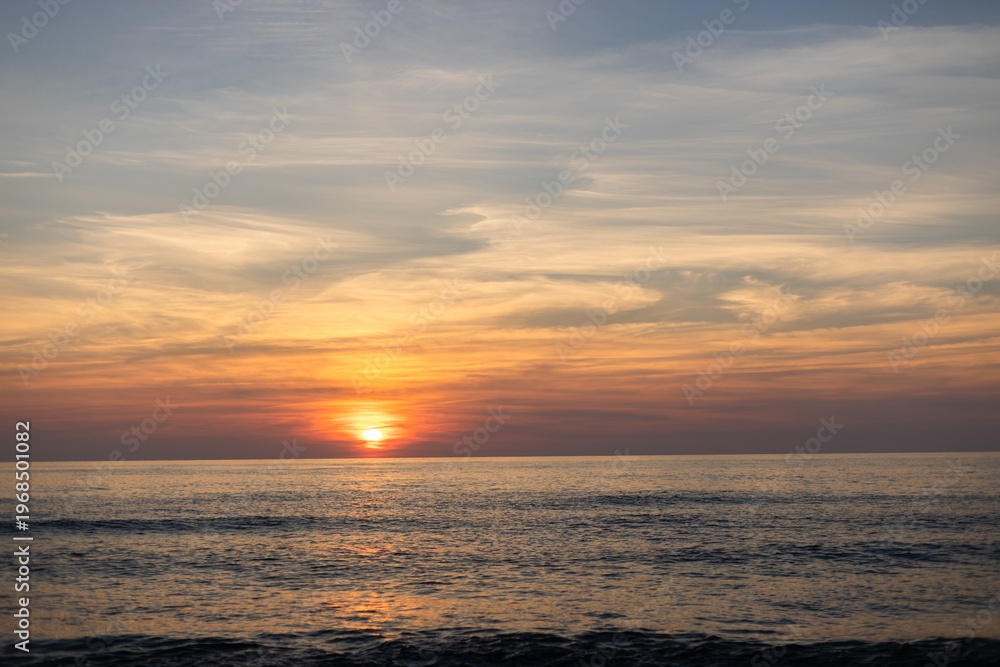 Obraz premium Colorful sunset over calm sea horizon, natural background Lithuania