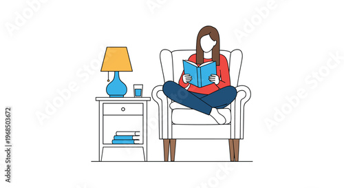 Cozy scene of a woman sitting cross legged in an armchair reading a book next to a lamp and side table.