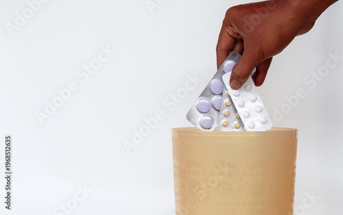 Obraz na plátně Expired medicines in the form of tablets are thrown into the trash for recycling or disposal