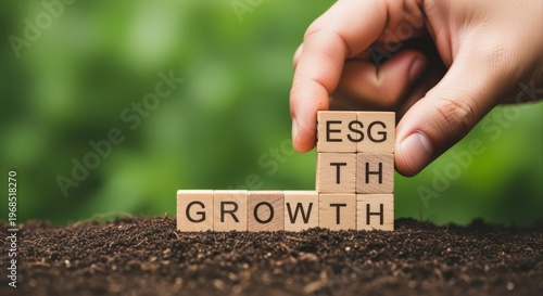 Wallpaper Mural ESG Growth Concept: Hand Completes Blocks on Soil Background, Symbolizing Sustainable Business and Investment Practices Torontodigital.ca