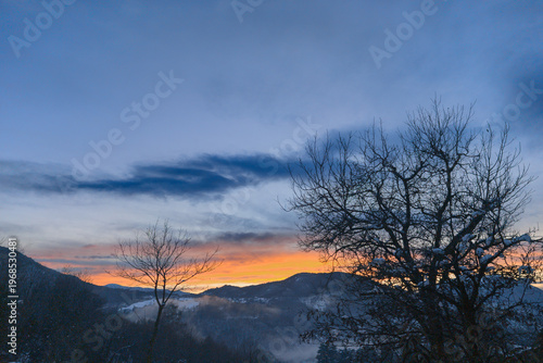 Sunset above the peaks of Como lake, Lombardy, Italy
