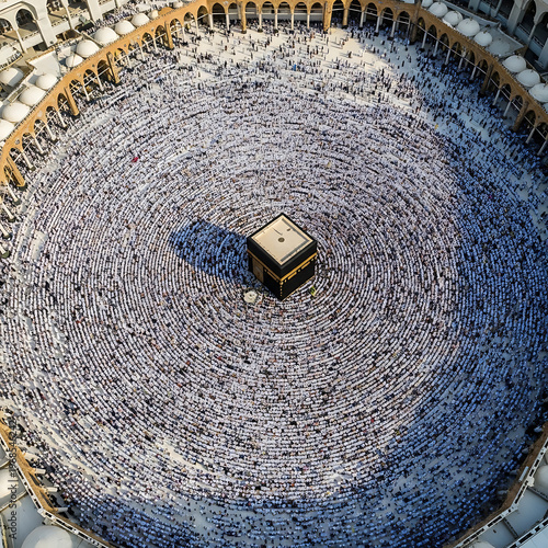 A vast number of pilgrims perform Tawaf around the Kaaba from above.