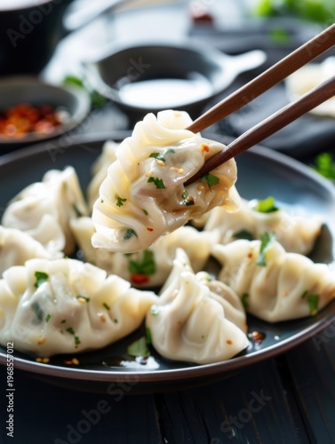 Delicious dumplings with beef and herbs served on a plate with chopsticks in a cozy kitchen setting