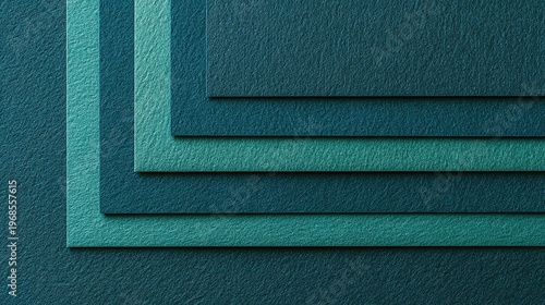 Teal Sheets of Paper Laid Out in Gradient Order