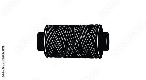 Black spool of thread with intricate winding a dark silhouette
