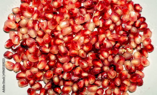 Pomegranate seeds are peeled.The texture of a ripe pomegranate.Pomegranate ripe background.