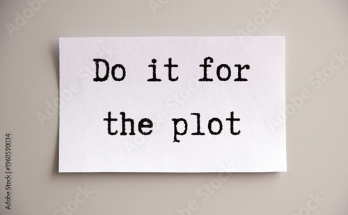 фотографія paper note saying 'Do it for the plot', isolated on grey background, american ty