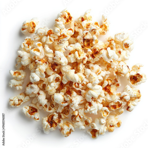 Popcorn pile with golden brown kernels on white background