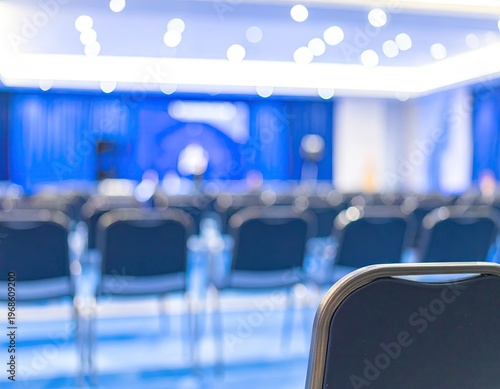 Empty Conference Room with Rows of Chairs and Blue Lighting.