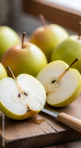 Freshly Cut Apples on Wooden Surface.
