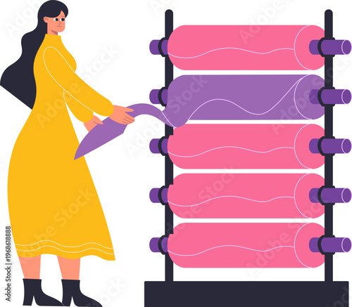 Woman selecting fabric from rolls for textile design