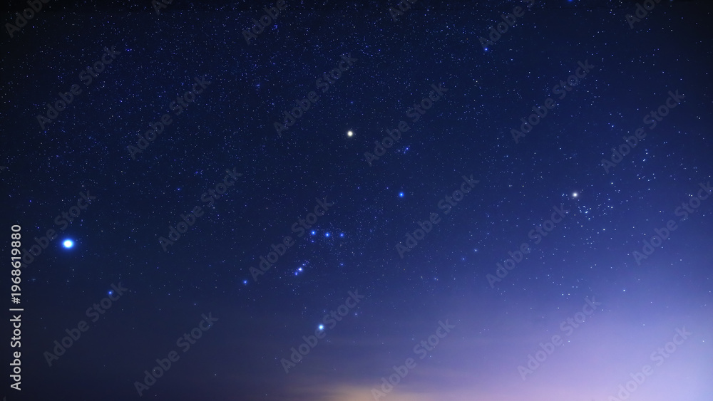 Fototapeta premium Orion constellation and Milky Way stars on a dark countryside skies.